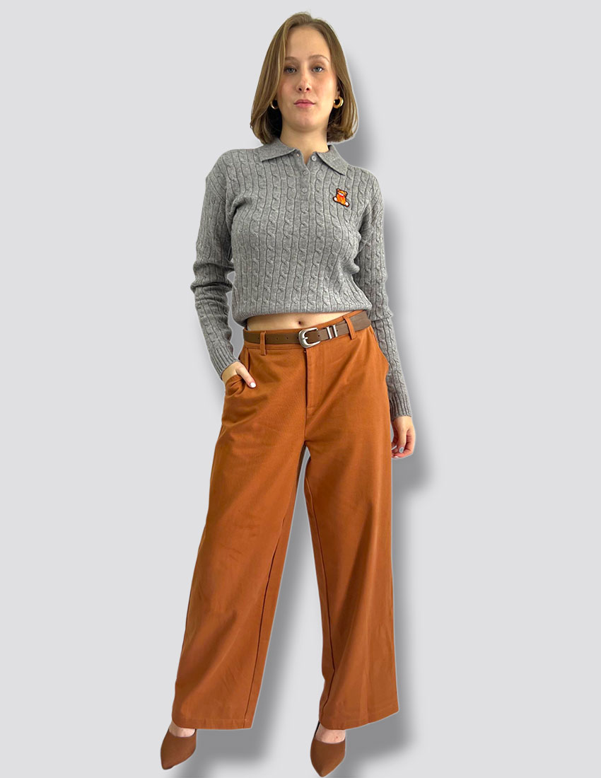 Jersey cuello tipo polo punto de cable aplicacion de teddy