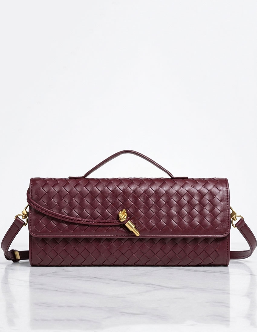 Bolso clutch tejido color burgundy