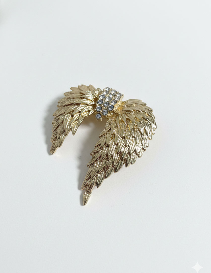 Broche diseño alas de angel con detalles de pedreria
