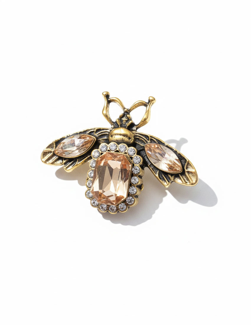 Broche diseño abeja con pedrería color champagne